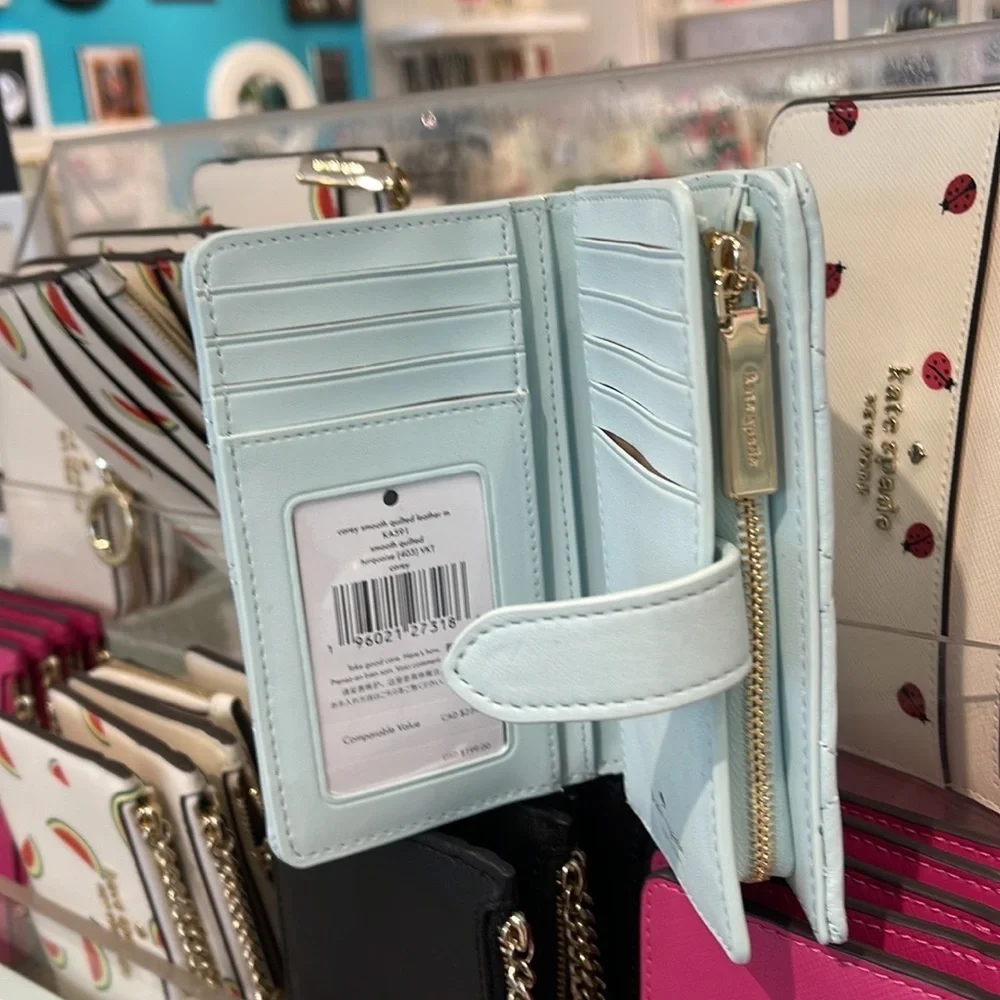 Kate Spade Carey Medium Compartment Bifold Wallet 
COLOR: Turquoise - Picture 3 of 16